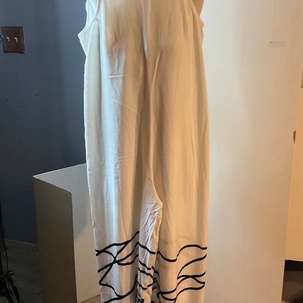 Cream Sleeveless Wide-Leg Jumpsuit with Black Wave Trim